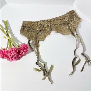 Victoria’s Secret Floral Lace Garter Belt.